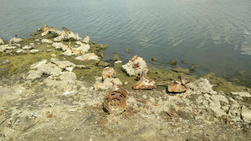 Cliff Pools Burnt Out Car