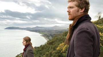 Glenn Hansard and Marketa Irglova look out from a cliff-top across the sea in Once.