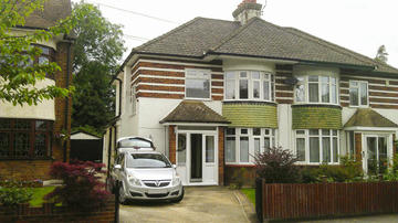 A typical 1930s house on a typical street in a typical British town.